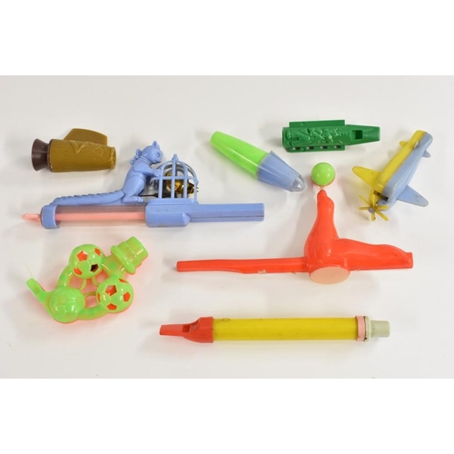 24 - Penny Whistles - plastic, Cat looking in Canary cage, aeroplane, footballs, yellow whistle, seal bal... 