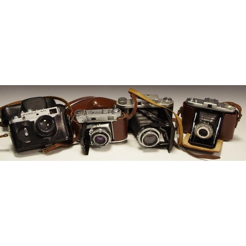 324 - Photographic interest - A Russian Zorki-4K 35mm camera; an Ensign Selfix 820 Special bellows camera;... 