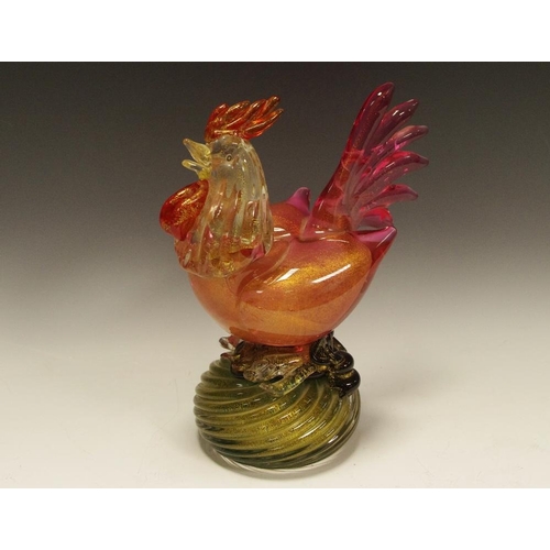 335 - An Art Deco coloured glass cockerel, spiralled base, 23cm high