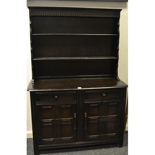 346 - An Oak Dresser, shaped uprights and shelves to top, two drawers over two door cupboards to base.