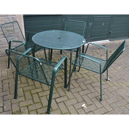 390 - A green painted metal patio set comprising circular table and four chairs. (5)