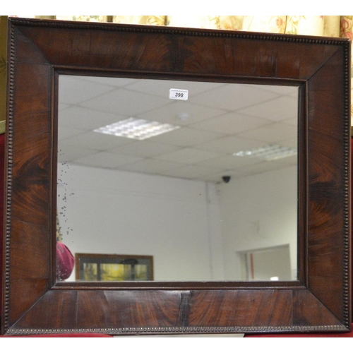 398 - A Victorian mahogany framed wall mirror.