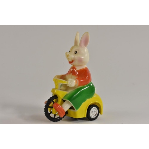 39 - A Rosenthal plastic  clockwork, Bunny on a tricycle, his feet peddle as he moves