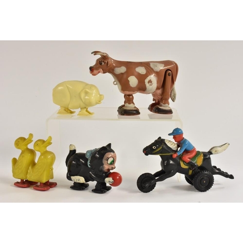 42 - Shufflers/Ramp Walkers - a cow, brown and white markings, made in Hong Kong; two ducks, plastic; Fig... 