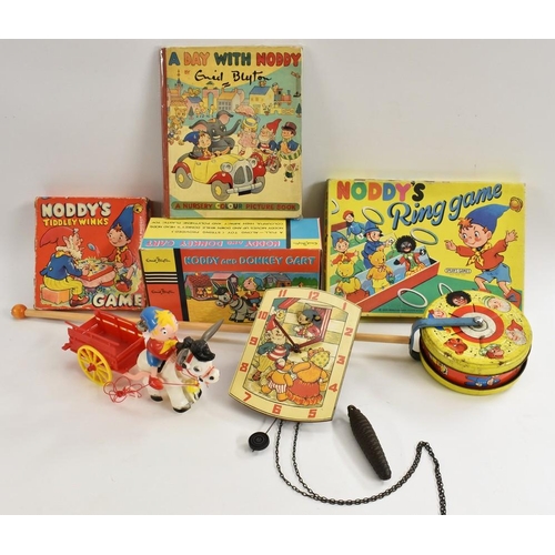 48 - A Paiko, made in Portsmouth, UK novelty wooden Noddy clock, with instructions; a Noddy walking music... 