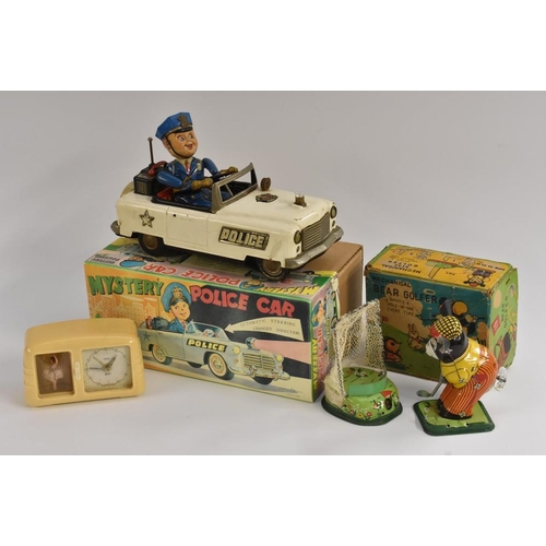 63 - Tinplate - a Bear Golfer, mechanical toy, made in Japan by TPS, in original box; a  Mystery Police C... 