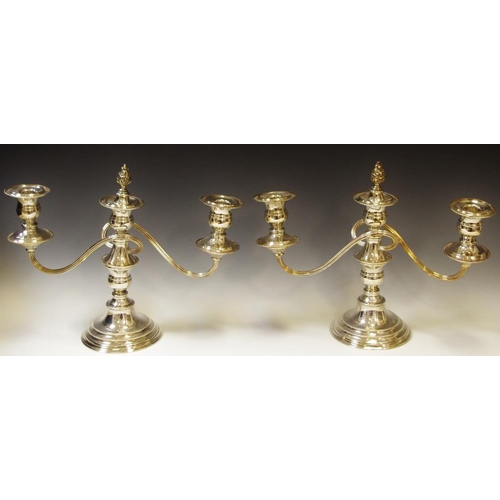 77 - A pair of EPNS three light two branch table candelabra