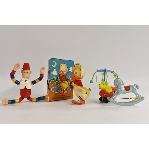 67 - Walking Chicken, Molly, Made in West Germany; a small plastic rocking horse; a plastic monkey; a clo... 