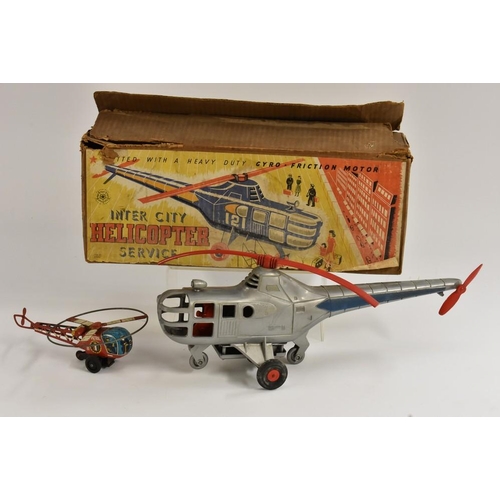 76 - An Intercity Helicopter Service helicopter, made by Tudor Rose, plastic, gyro-friction motor; a tin ... 