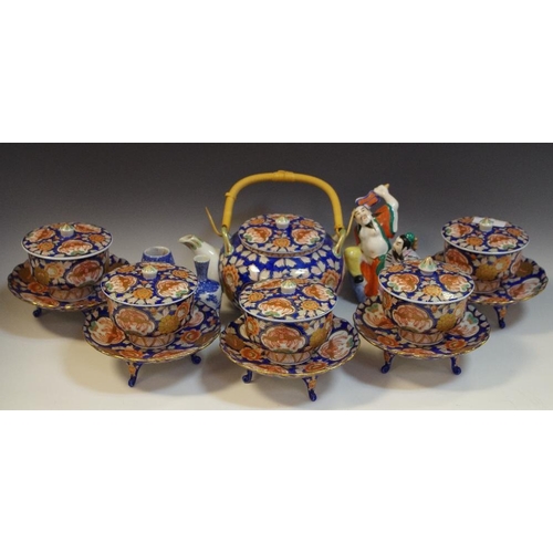 88 - A Contemporary transfer printed ceremonial tea set, in the imari palate, a figure group,