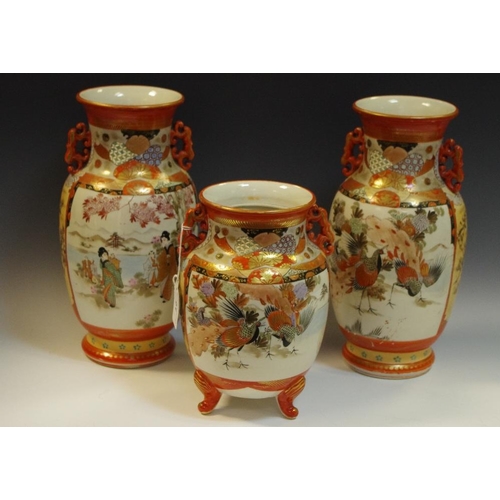 91 - A Japanese Satsuma three piece garniture, one vase signed to verso