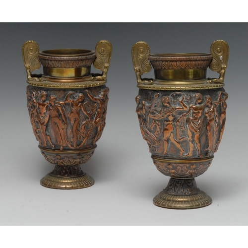 1578 - A pair of Victorian Grecian Revival bronzed and brass vases, in relief with classical figures, scrol... 