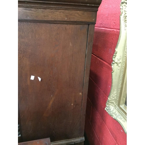 1581 - A George III Welsh oak housekeeper's press cupboard, outswept cornice above a pair of rectangular do... 