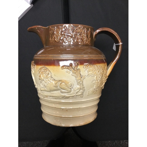 22 - A 19th century Brampton brown salt glazed pottery jug, in relief with busts of Prince Albert and Que... 