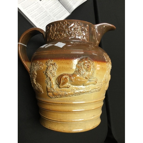 22 - A 19th century Brampton brown salt glazed pottery jug, in relief with busts of Prince Albert and Que... 