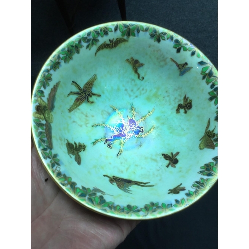 28 - A Wedgwood Fairyland Lustre pedestal bowl, designed by Daisy Makeig-Jones, printed and painted in co... 