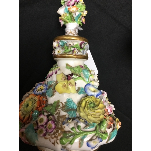 41 - A pair of English Porcelain scent bottles, probably Spode, encrusted with colourful flowers, 17cm hi... 