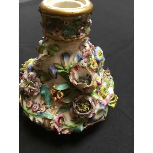 41 - A pair of English Porcelain scent bottles, probably Spode, encrusted with colourful flowers, 17cm hi... 