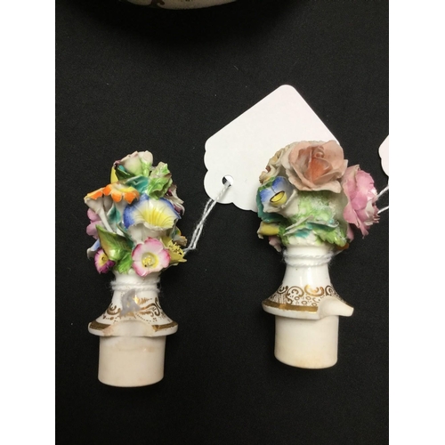 41 - A pair of English Porcelain scent bottles, probably Spode, encrusted with colourful flowers, 17cm hi... 