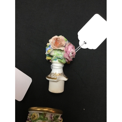 41 - A pair of English Porcelain scent bottles, probably Spode, encrusted with colourful flowers, 17cm hi... 