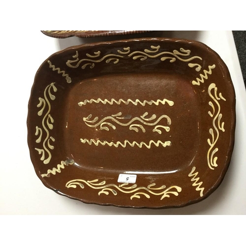 5 - A 19th century Slipware rounded rectangular dish, decorated in typical manner with geometric devices... 