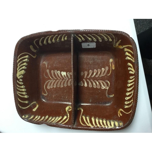 5 - A 19th century Slipware rounded rectangular dish, decorated in typical manner with geometric devices... 