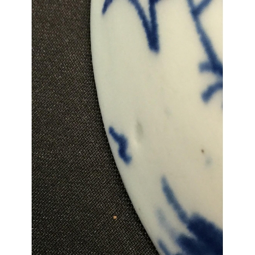 58 - A Lowestoft Willow pattern circular bowl, painted in underglaze blue with a stylized chinoiserie lan... 