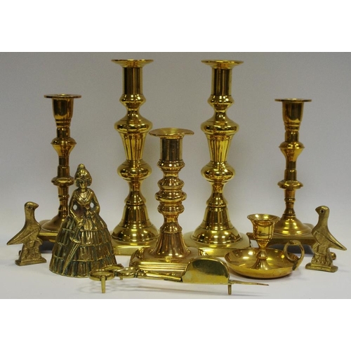 25 - A pair of George III brass ejector candlesticks; another 18th century etc.