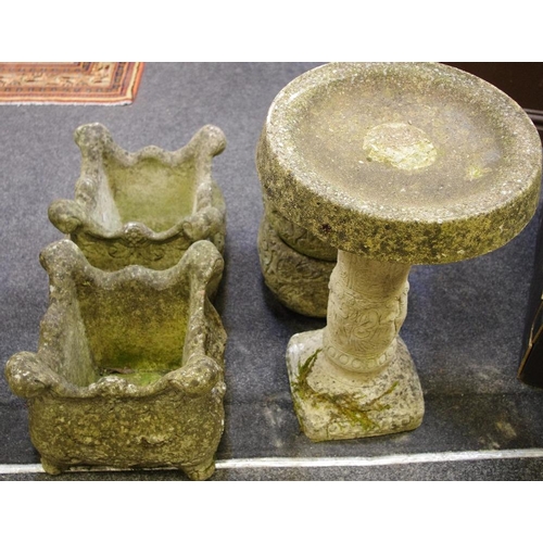 314 - Two composite circular garden planters; two others, square; a composite bird bath. (5)