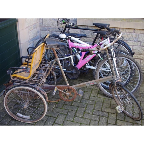 344 - Bicycling - a mid 20th century tricycle; four others