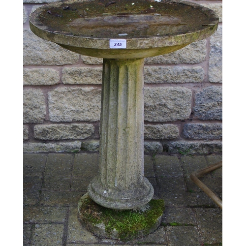 345 - A 20th century composite bird bath, fluted column