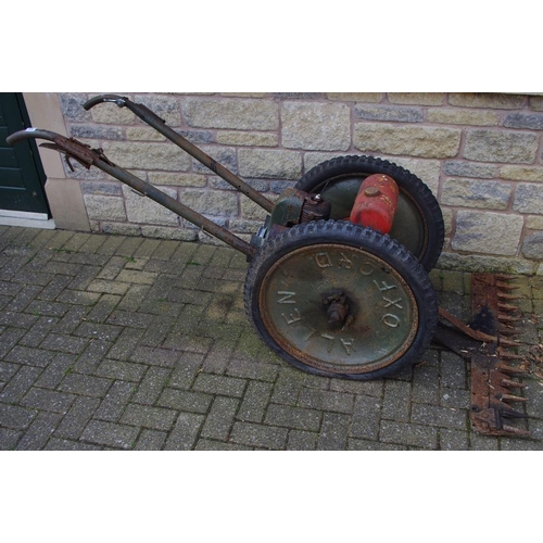 349 - An Allen power scythe, petrol engine, finger bar mower.