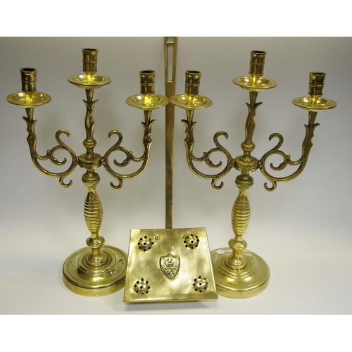 35 - A Pair of cast brass two branch candlesticks, scrolling arms, a chestnut roaster (3).