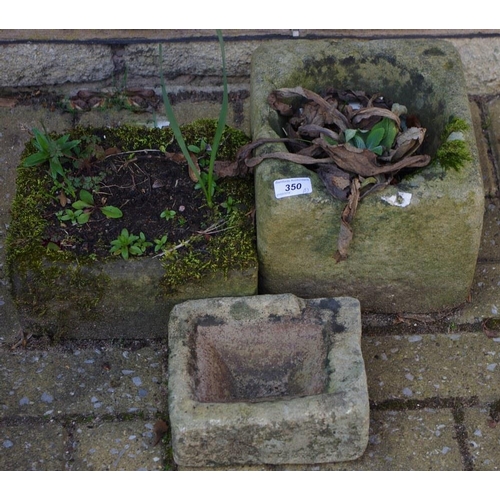 350 - A miniature Derbyshire gritstone trough; another two,larger, composite (3)