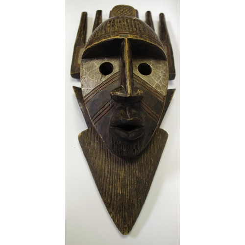 37 - Tribal - an African comb mask.