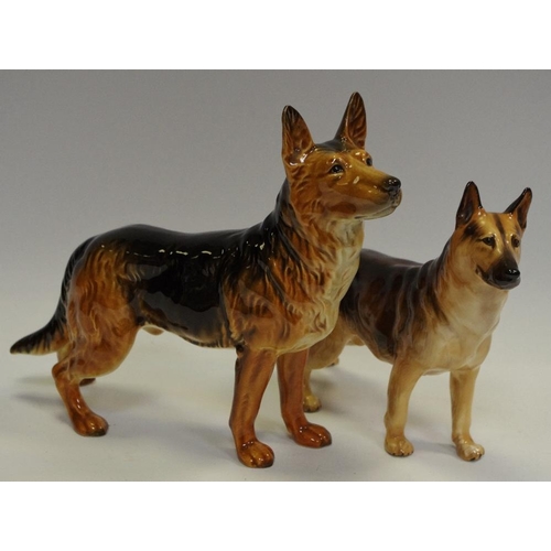 40 - A Goebel porcelain model of an Alsatian in standing pose, modelled by Gerhard Skrobek, printed marks... 