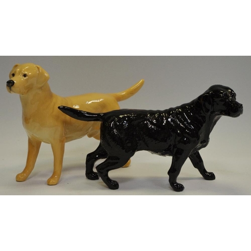 42 - A Beswick model of retriever, printed marks to paw; a Beswick model of a Golden Retriever, printed m... 