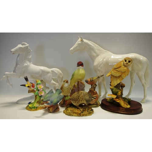 121 - A Royal Worcester Woodpecker, 3249; Staffordshire Goldfinch; others, Chaffinch; Quail; a Beswick whi... 