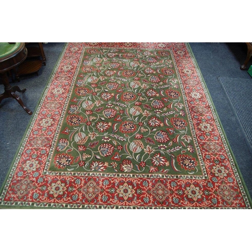 134 - A Mossoul hand finished woollen rug 243cm x 172cm