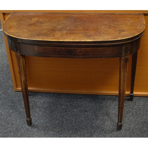 388 - A George III demi-lune mahogany card table