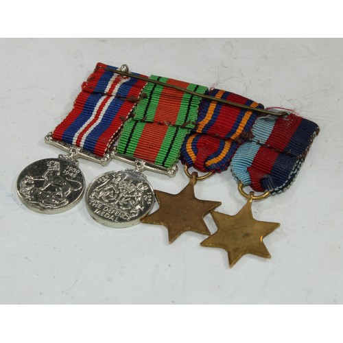 477 - Medals - WWII miniatue dress medals, the 1939-1945 Star, the Burma Star, the Defence Medal 1939-1945