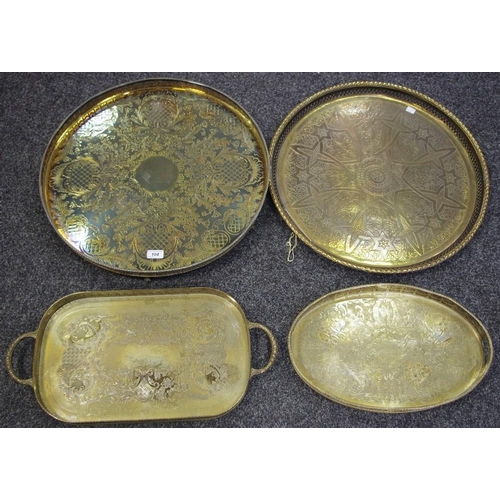 104 - Metalware - a large EPNS salver, pierced fretwork gallery, chased throughout with foliate scrolls, b... 