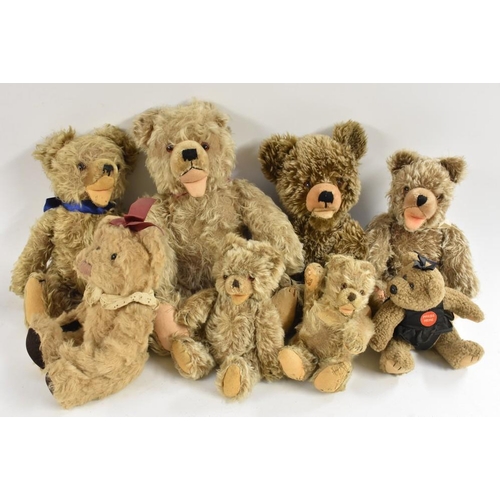 3068 - Stuffed Toy Bears -  a graduated match family of four mid 20th century gold plush bears, larger cent... 