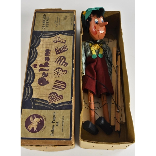 3086 - Pelham Puppets -  Pinnochio,green checker shirt, yellow braces, red shorts, green felt hat, brown bo... 