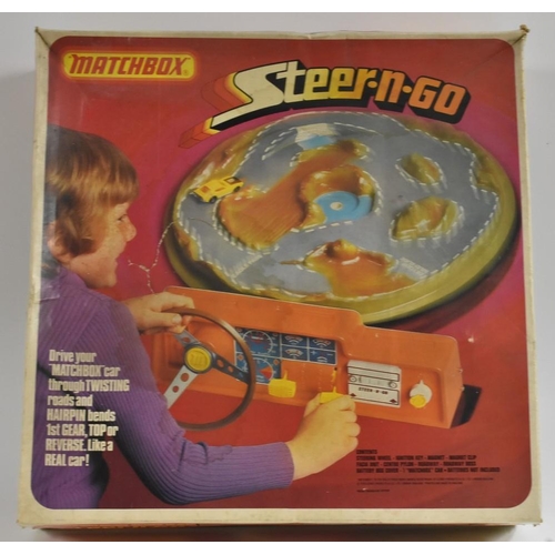 3102 - Matchbox Toys - a Steer-N-Go driving game, with No1 Dodge Challenger car, boxed, c.1975