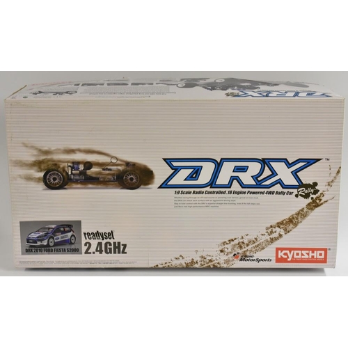 3263 - Radio Control  - a Kyosho 2.4ghz KT200 DRX radio controlled Ford Fiesta DRX 2010 S2000 .18 powered p... 