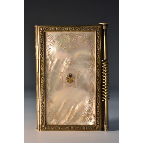 1144 - A 19th century French Palais Royale gilt-metal mounted mother-of-pearl aide-memoire, each rectangula... 