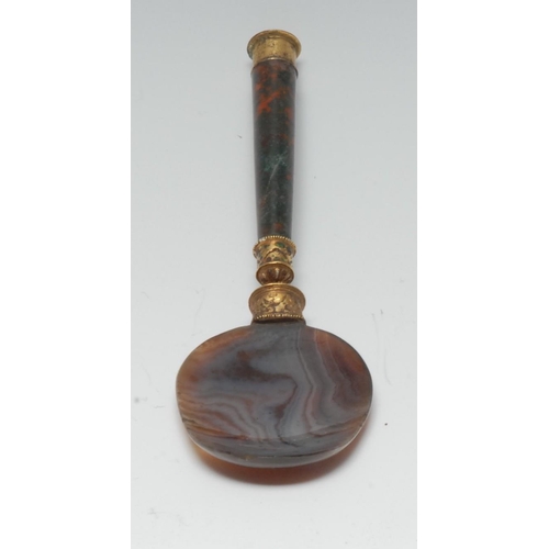 1157 - An 18th century agate spoon, blood agate cannon barrel handle, the  gilt metal mounts enamelled with... 