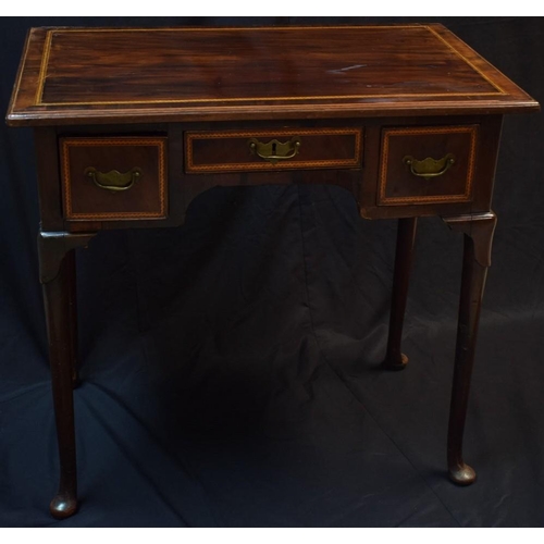 1199 - A mid-18th century fruitwood lowboy, oversailing top above three frieze drawers, outlined throughout... 