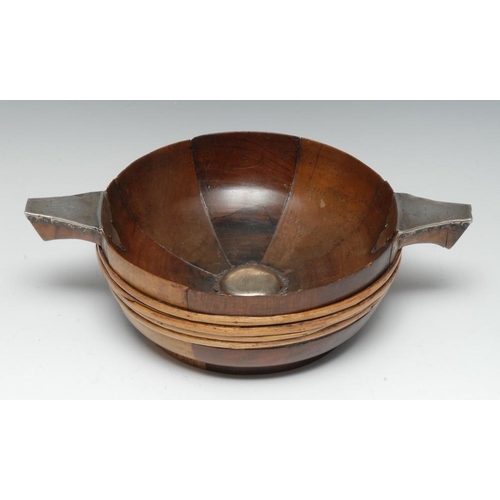 1202 - Treen - a large 17th century Scottish silver mounted laburnum quaich, the staved bowl centred by a b... 